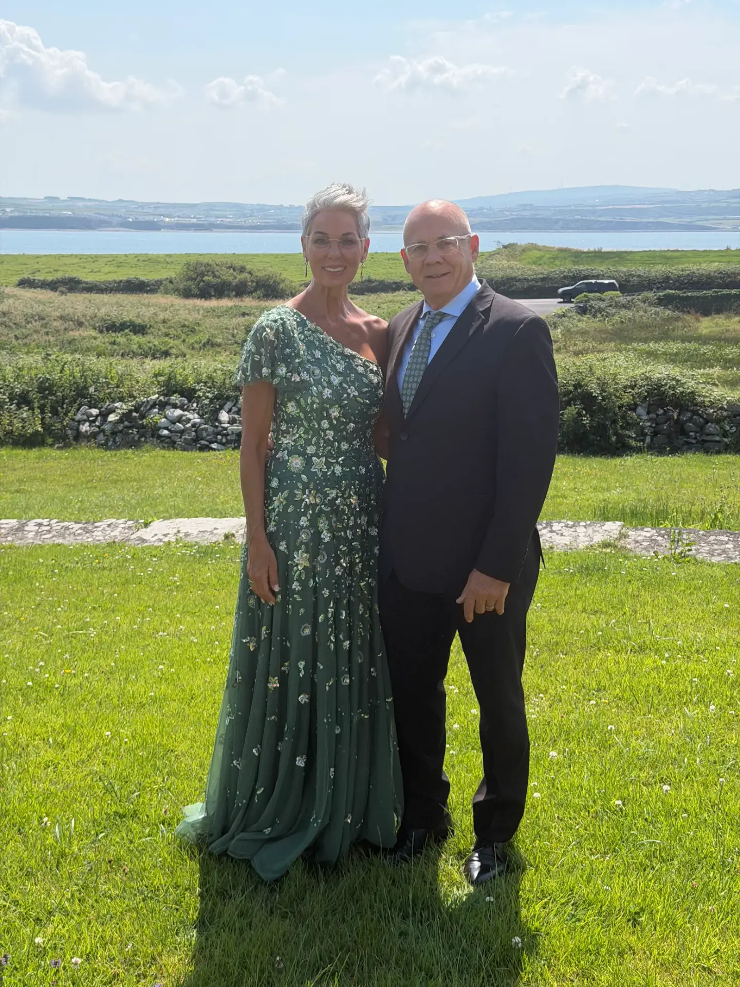 Robin and her husband dressed for their daughter's wedding in Ireland