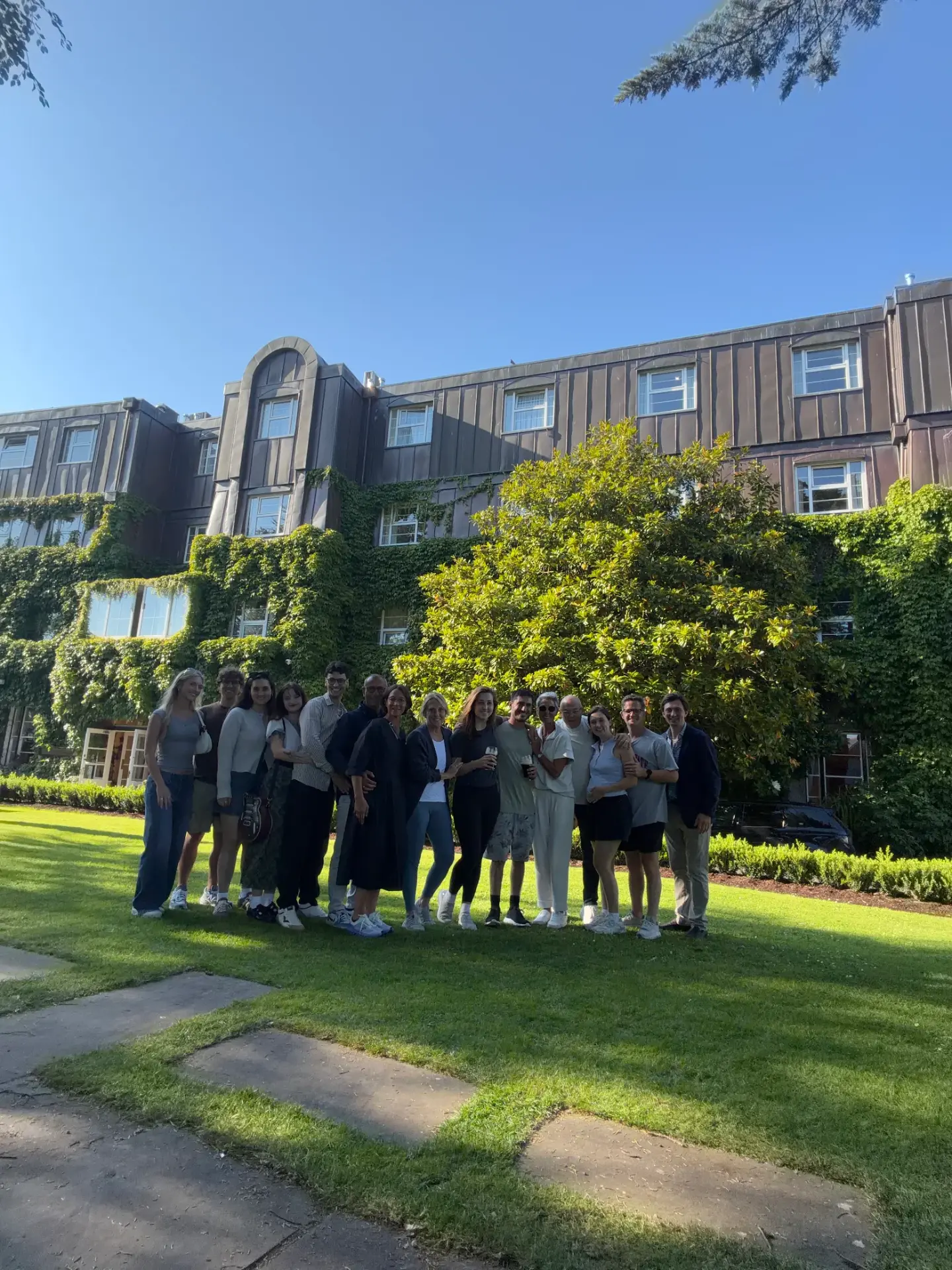 The wedding group in front of the ivy covered hotel in Ireland