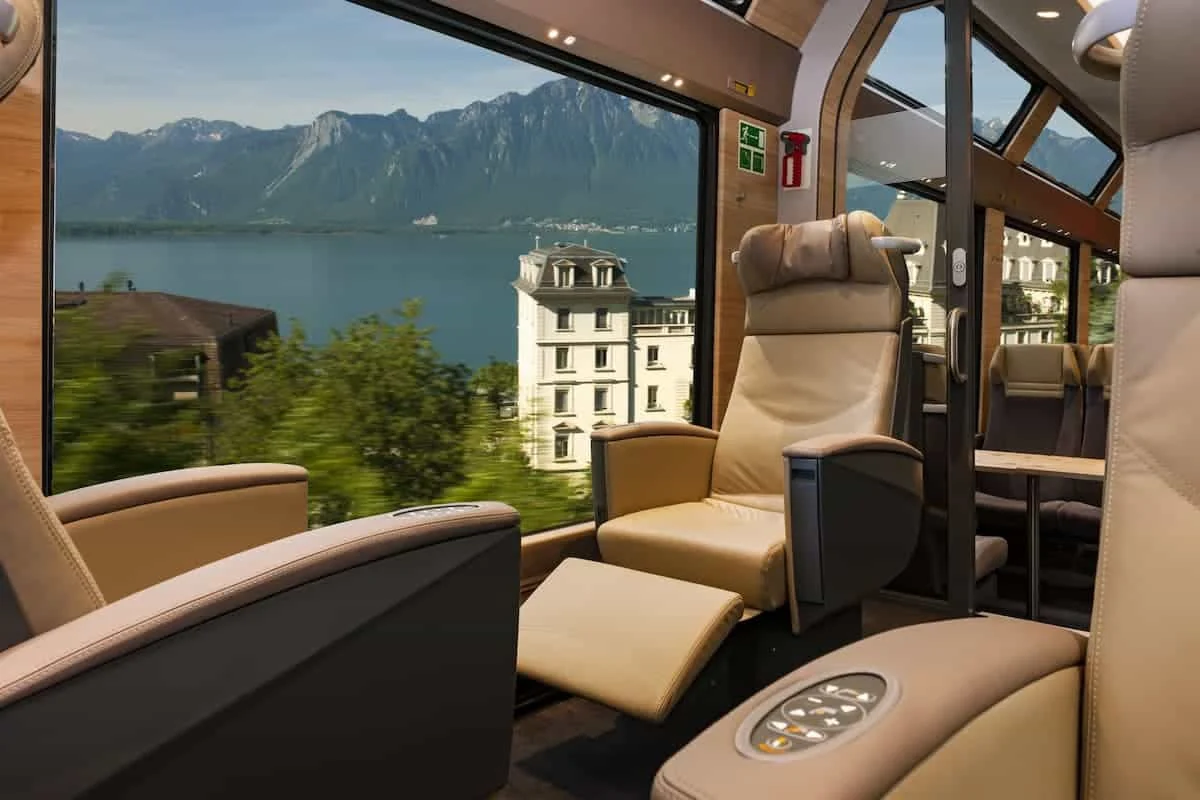 GoldenPass Express Prestige class reclining seat beside panoramic windows above Lake Geneva near Montreux