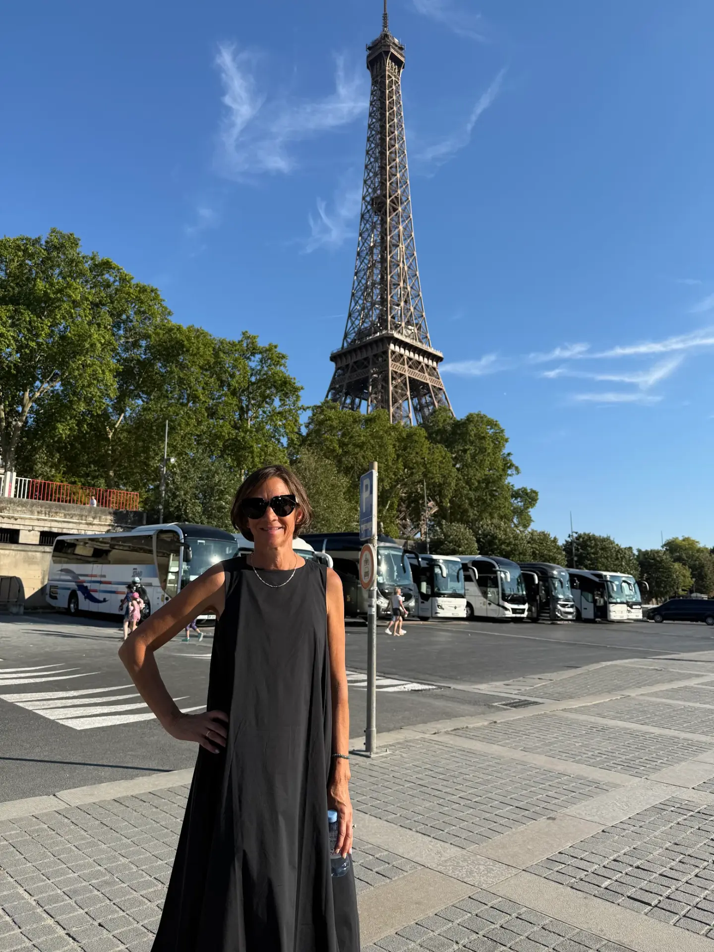 Riccardo's wife in front of the Eiffel Tower in Paris, France