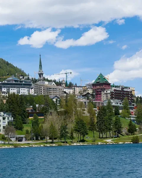 St. Moritz hotels and church spire above Lake St. Moritz in the Swiss Alps