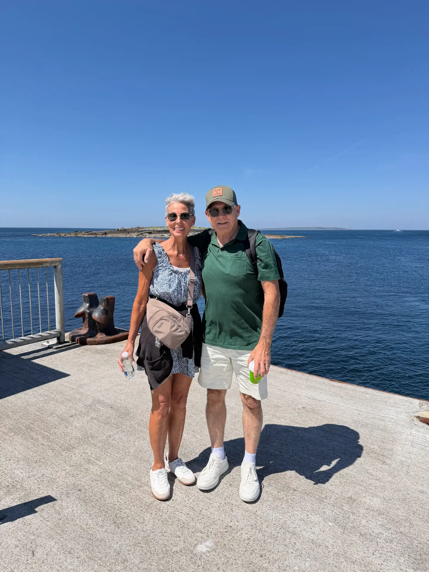 Robin and her husband on a dock by the Atlantic in Ireland